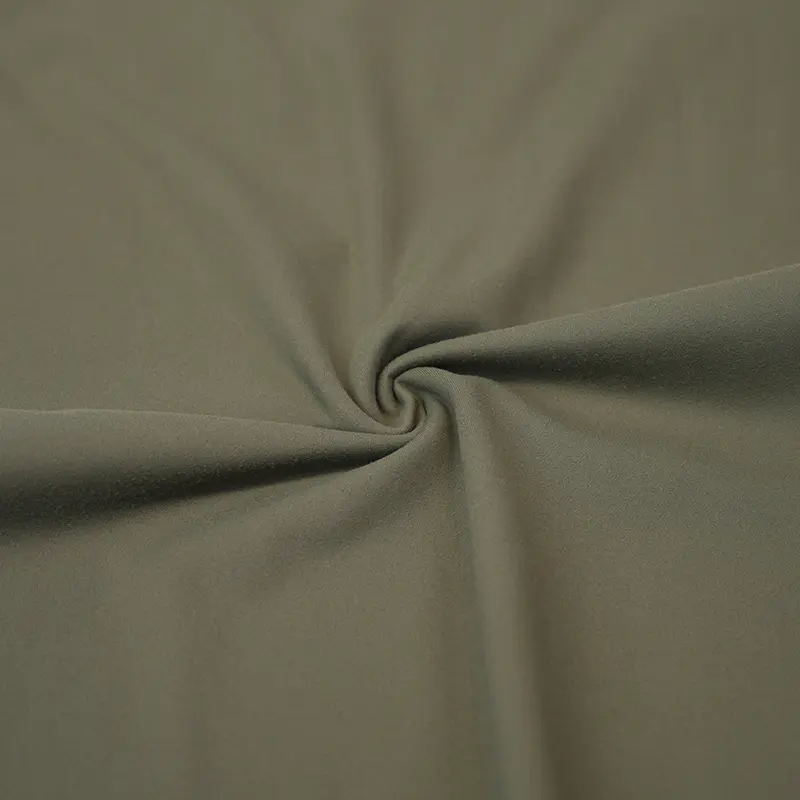 Hva er nylon spandex interlock -stoff, og hvordan er det forskjellig fra andre typer strikkede stoffer?