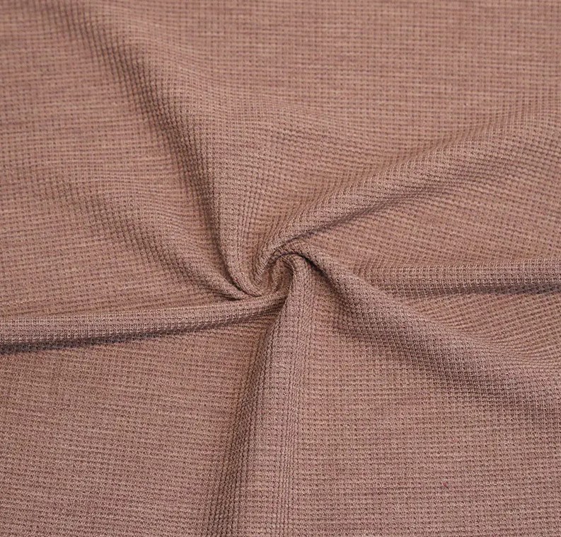 Hvordan påvirker vaffelstrukturen ytelsen til bambus/polyester -strekkvaffel?